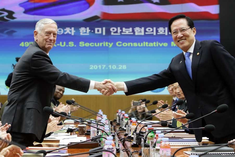 James Mattis shakes hands with South Korean defense minister Song Young-moo. Photo Credit: The Guardian