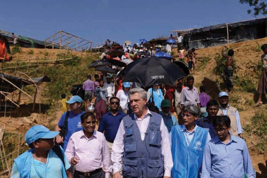 United Nations High Commissioner for Refugees Filippo Grandi, centre, visits newly arrived Rohingya Muslims at Kutupalong refugee camp on September 23, 2017. —Photo: AP