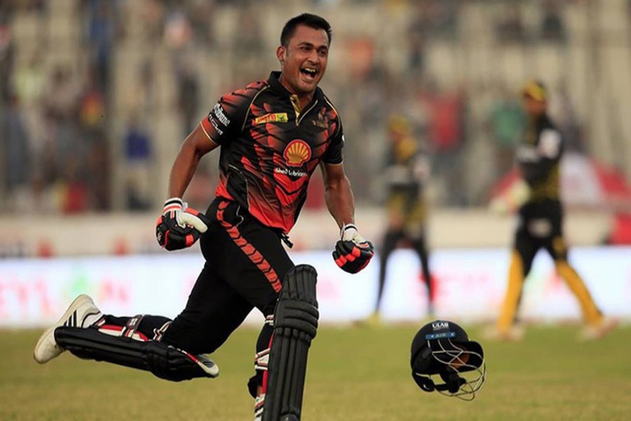 Khulna Titans' Ariful Haque celebrates after winning the match against Rajshahi Kings in the 5th BPL T20 at the Sher-e-Bangla National Cricket Stadium at Mirpur in the city on Tuesday. — bdnews24.com
