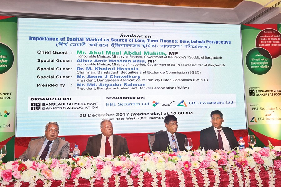Guests seen in the seminar titled 'Importance of Capital Market as Source of Long Term Finance: Bangladesh Perspective', arranged by Bangladesh Merchant Bankers Association (BMBA) Wednesday. — FE Photo