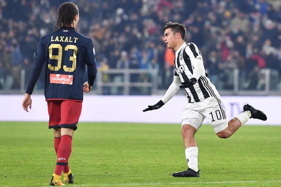 Juventus' Paulo Dybala celebrates after scoring his team's first goal during an Italian Cup round of 16 soccer match between Juventus and Genoa at Turin's Allians Stadium on Wednesday. — AP