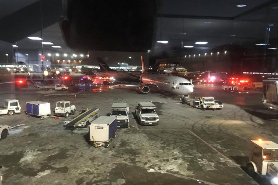 Emergency services arrive at a site where two planes collided at Toronto's Pearson Airport, Canada, January 5, 2018 in this still image taken from social media video. (REUTERS)