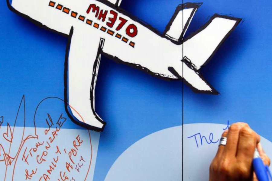 In this file photo, well wishes are written on a wall during a remembrance event for the ill-fated Malaysia Airlines Flight 370 in Kuala Lumpur, Malaysia. – AP photo