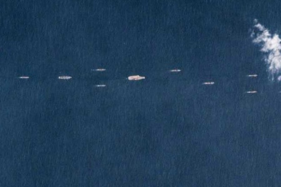 The picture taken by Planet Labs Inc., appears to show the Liaoning carrier at the centre of a formation. - ndtv.com