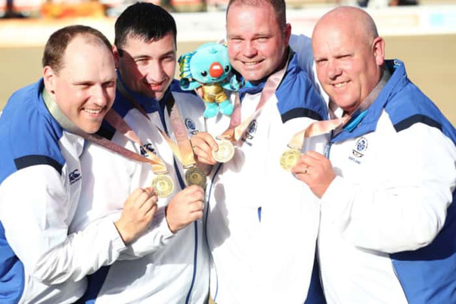 Ronald Duncan, Derek Oliver, Paul Foster and Alex Marshall celebrating the gold — Internet