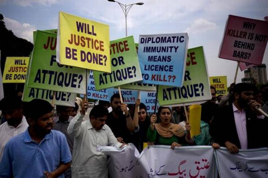 Pakistani protesters stage a rally demanding a trial for an American diplomat involved in a vehicle crash that killed a person, in Islamabad, Pakistan, on April 10, 2018. Pakistan has decided to impose reciprocal restrictions on US diplomats after US imposed similar curbs on Pakistani diplomats. - Photo Credit: AP