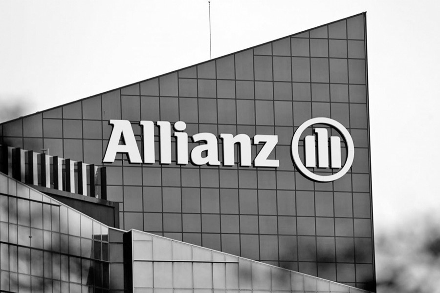The logo of insurer Allianz SE seen on the company building in Puteaux at the financial and business district of La Defense near Paris, outside Paris, France — Reuters
