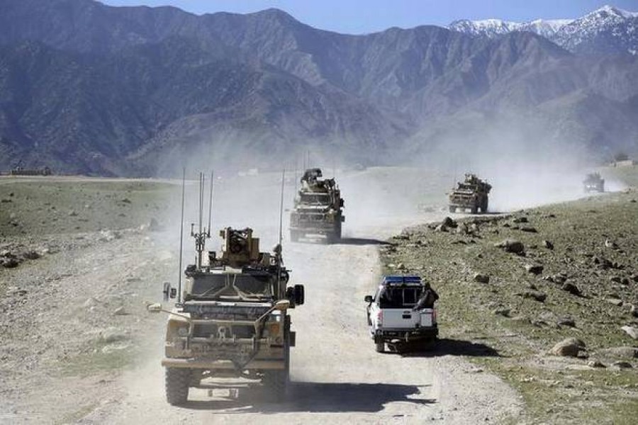 In this file photo, the US forces and the Afghan commando patrol Pandola village, as the Taliban is still either controlling or threatening almost 70% of Afghanistan. Photo Credit: AP