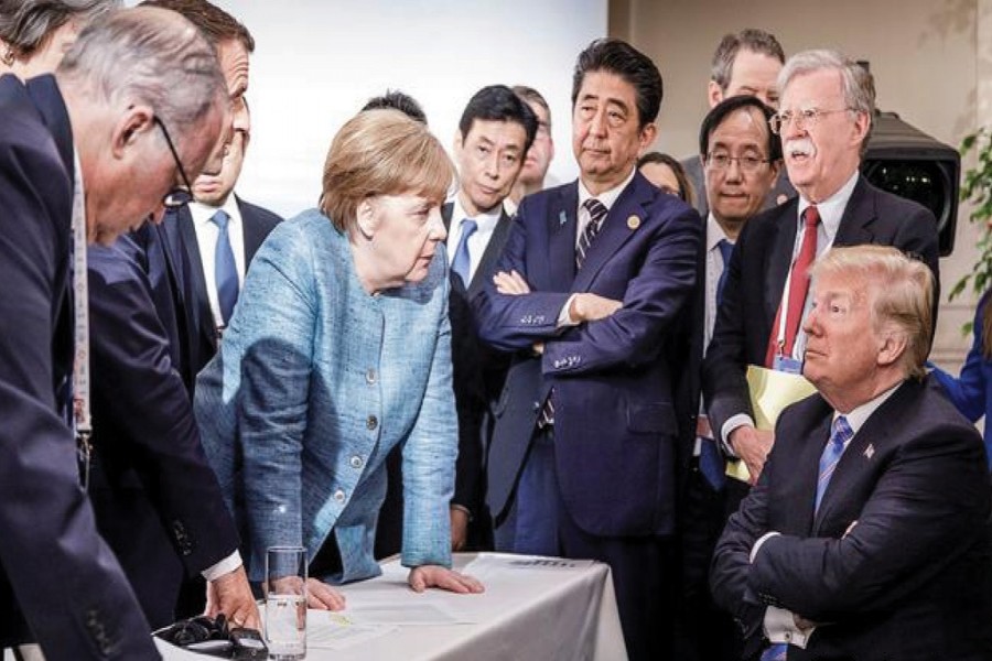 German Chancellor Angela Merkel, surrounded by others G7 leaders, confronts President Donald Trump at the Montreal Summit of the grouping of the rich countries. Merkel posted this photograph on her Instagram page. —Photo: Reuters