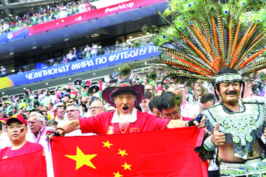A Chinese fan lets his presence be known during the World Cup match between Germany and Mexico in Moscow — Internet
