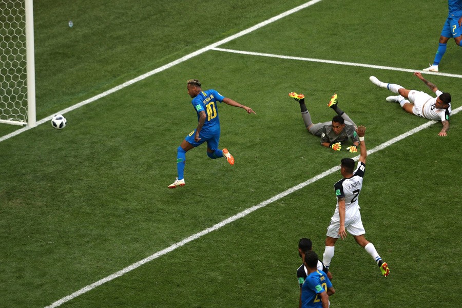 Neymar scores Brazil's second goal in injury time against Costa Rica in Friday's World Cup match