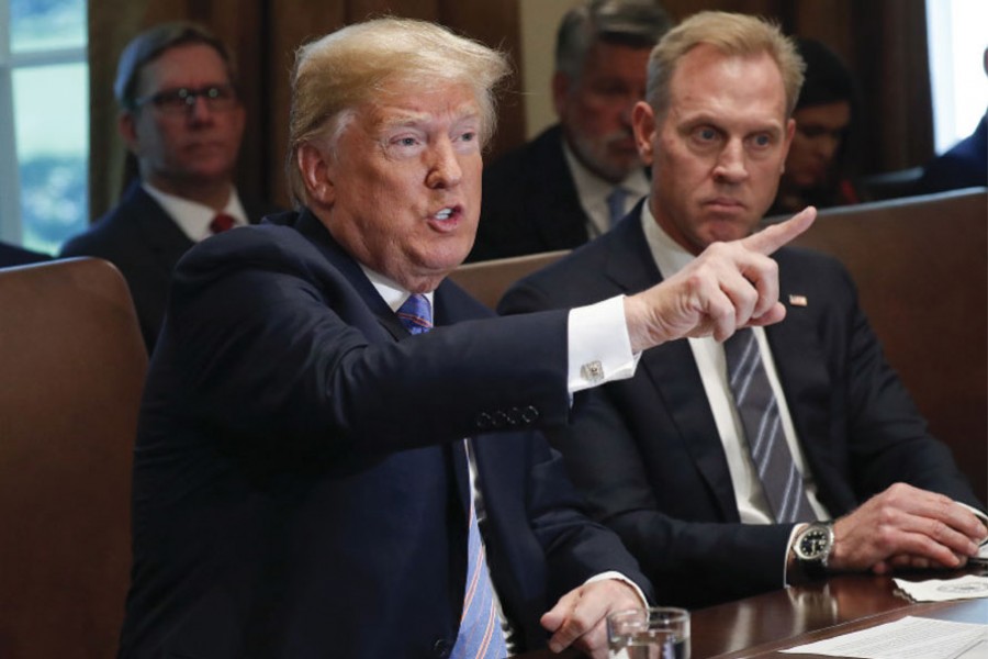 PRESIDENT DONALD TRUMP GESTURES WHILE SPEAKING DURING HIS MEETING WITH MEMBERS OF HIS CABINET IN THE CABINET ROOM OF THE WHITE HOUSE IN WASHINGTON, ON JULY 18, 2018: His toughness with Vladimir Putin in question, President Donald Trump declared on Wednesday he had told the Russian leader face to face to stay out of America's elections "and that's the way it's going to be." —AP