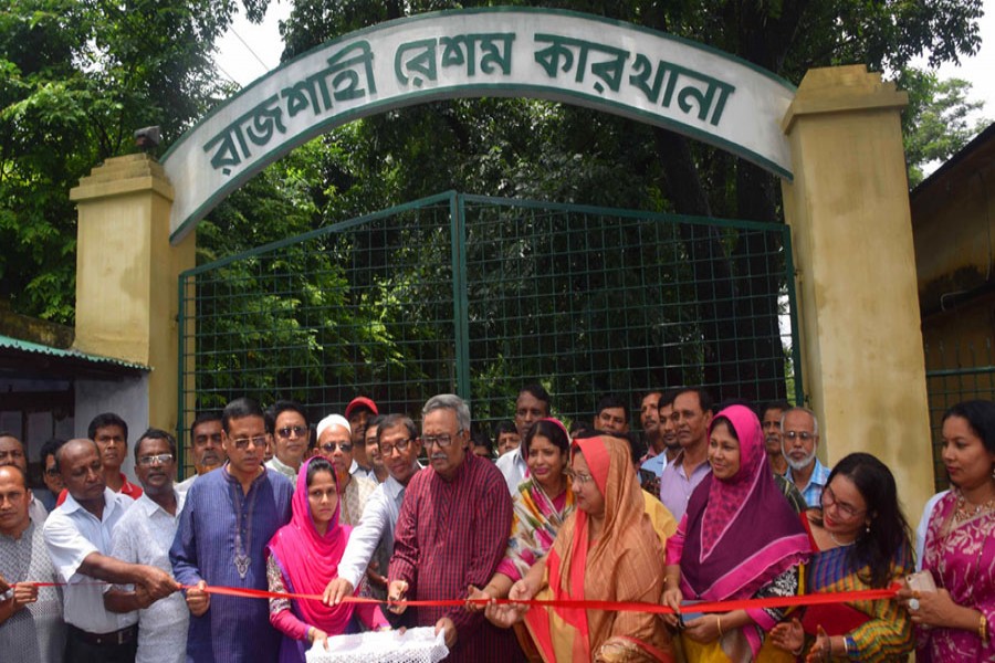 Fazley Hossain Badsha, MP, inaugurating operation of five looms of Rajshahi Silk Mills in Rajshahi on Friday — FE Photo