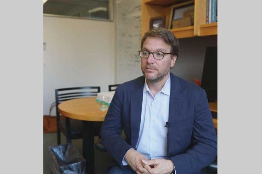 Robert Salomon, associate professor of International Management at New York University, is interviewed by Xinhua at his office in New York City, the United States, August 02, 2018: He told Xinhua that the Trump administration's tariff strategy is based on a faulty understanding of trade, and in particular trade deficits. — Xinhua