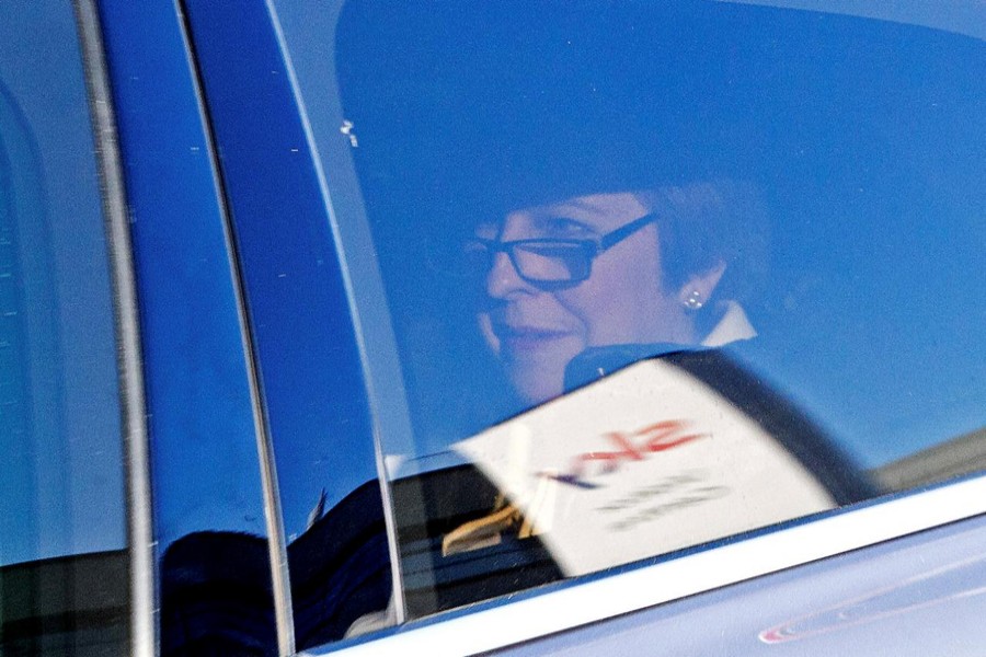 Britain's Prime Minister Theresa May leaves Sky television studios in west London, Britain, November 18, 2018. Reuters