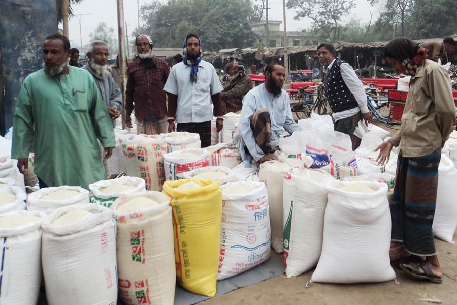 A view of a wholesale rice market in Singra upazila of Natore — FE Photo