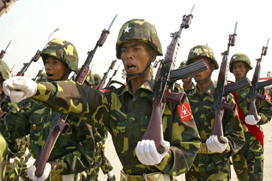 A file photo taken on October 14, 2016 showing military from Kachin Independence Army (KIA) preparing for military drills at the group's headquarters in Laiza, Kachin State — AP