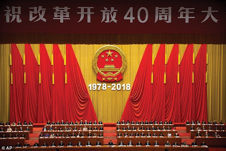 Chinese President Xi Jinping, bottom row centre, speaks during a conference to commemorate the 40th anniversary of China's Reform and Opening Up policy at the Great Hall of the People in Beijing on December 18, 2018. —Photo: AP