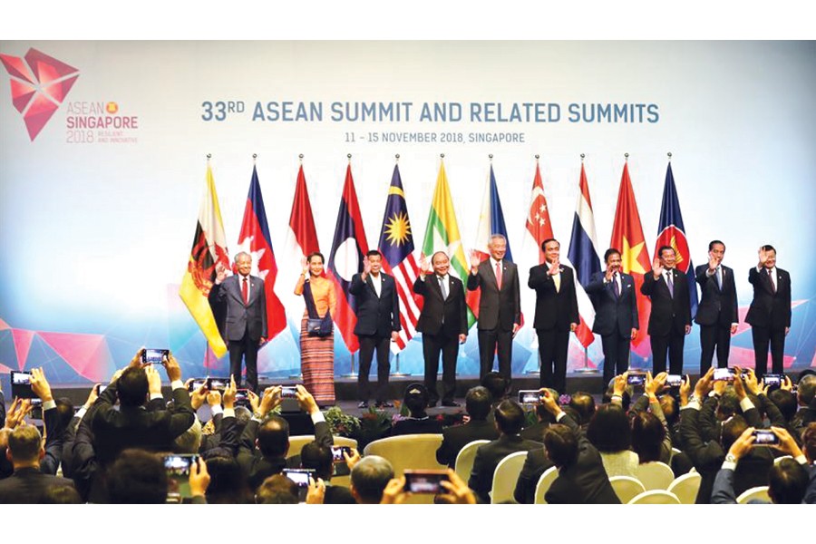 Leaders pose for photos during the opening ceremony of the 33rd summit of the Association of Southeast Asian Nations (ASEAN) in Singapore, on November 13, 2018: "As the European Union faces its first 'exit' this 2019, amid other powerful anti-regionalism sentiments triggered by immigrants and economic sclerosis, ASEAN partners are on the upswing: not consolidating ASEAN identities as much as teaming up with other Asian countries and outfits, even reaching out to Australia and New Zealand." –Photo: Xinhua