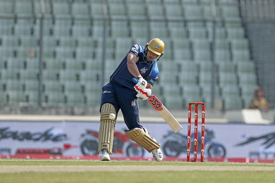 Dhaka Dynamites' batsman Afghan Hazratullah Zazai playing a shot against Khulna Titans during BPL at Sher-e-Bangla National Cricket Stadium in the city on Tuesday — BCB