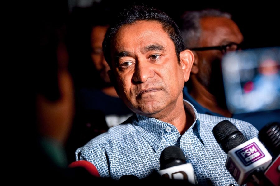 MALÉ: Maldives' former president Abdulla Yameen speaking to the media outside a police station where he had been questioned by investigators on money laundering allegations in Male on Tuesday --AFP