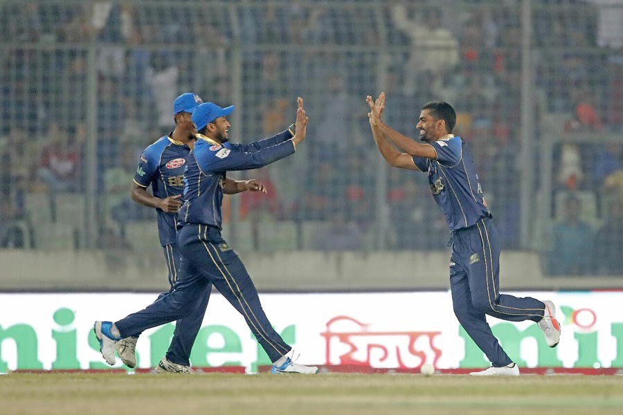 Dhaka Dynamites' Al Islam Alis celebrating after taking a wicket in the match against Rangpur Riders at Sher-e-Bangla National Cricket Stadium at Mirpur in the city on Friday — BCB