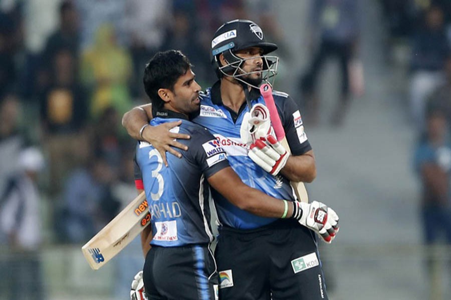 Rangpur Riders' Farhad Reza and Mashrafe Bin Mortaza celebrating after winning against Sylhet Sixers in Bangladesh Premier League (BPL) at Sylhet International Stadium on Saturday — bdnews24.com