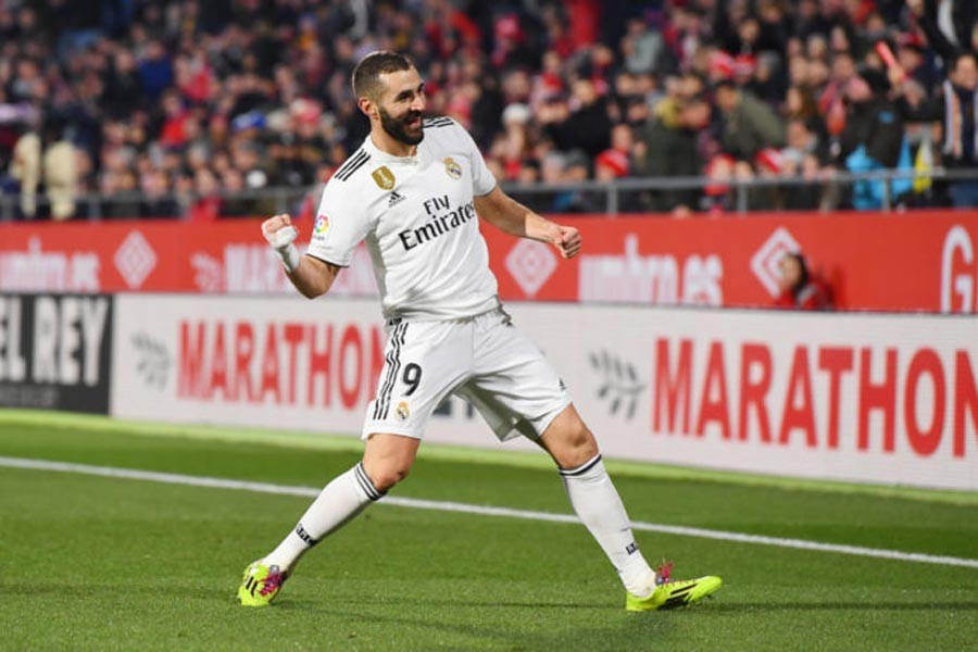 Real Madrid's Karim Benzema celebrating after scoring during the Copa del Rey quarterfinal match against Girona at Montilivi Stadium on Thursday — Internet