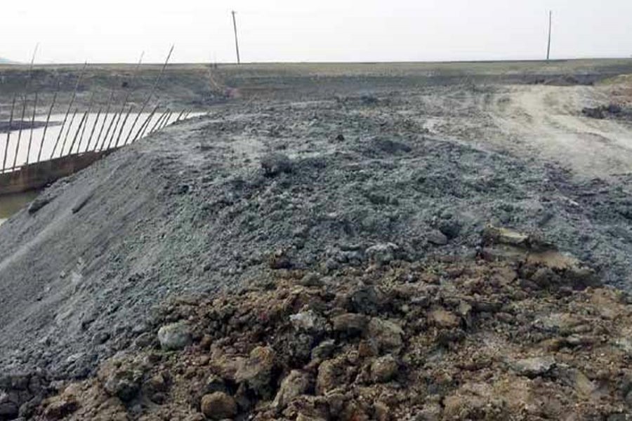 A crop protection embankment in Derai upazila nearing completion — FE Photo