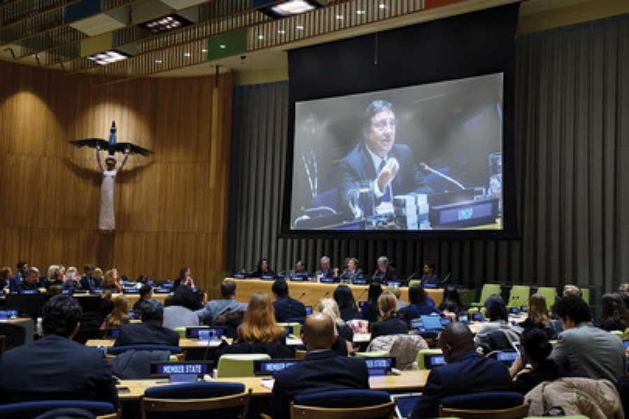 Achim Steiner (on screen and at dais), Administrator of the United Nations Development Programme (UNDP), speaks at the special event "Life Below Water: For People and Planet", held as part of the global celebration of World Wildlife Day 2019 (March 03). — UN photo