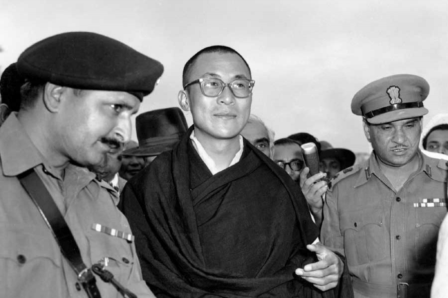 In this April 18, 1959, file photo, Tibetan spiritual leader the Dalai Lama, centre, arrives at Tezpur, Assam in India. – AP
