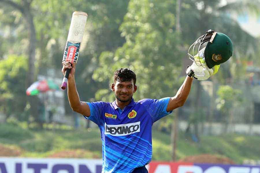 Abahani's Nazmul Hossain Shanto celebrating after scoring a half century against Uttara Sporting Club in the DPDCL at the Khan Shaheb Osman Ali Stadium in Fatullah on Monday — bdnews24.com