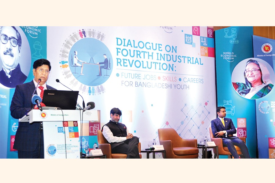 Foreign Minister AK Abdul Momen delivering a speech at a dialogue on 'Fourth Industrial Revolution: Future jobs - skills - careers for Bangladeshi youth' at a city hotel on Tuesday — Photo PID