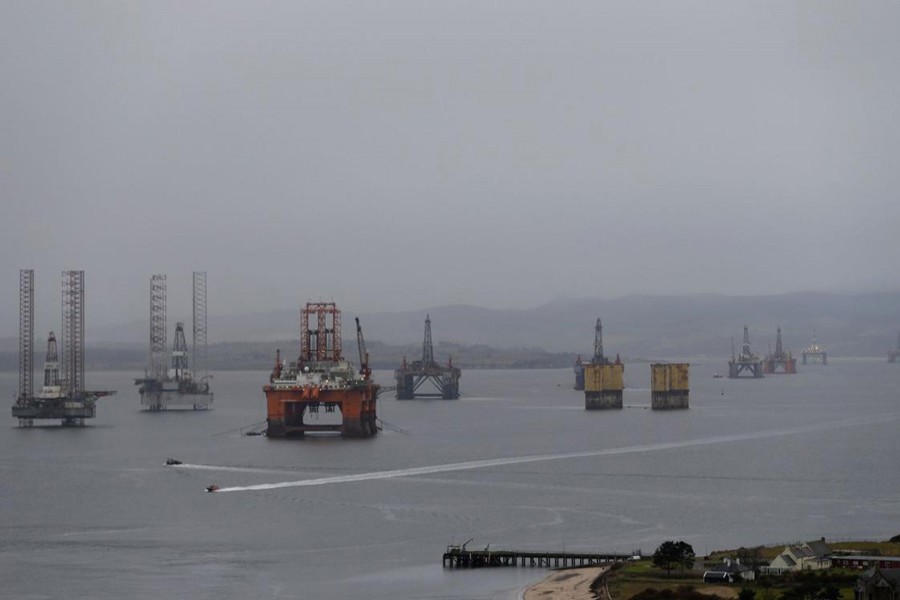 Drilling rigs are parked up in the Cromarty Firth near Invergordon, Scotland, Britain — Reuters