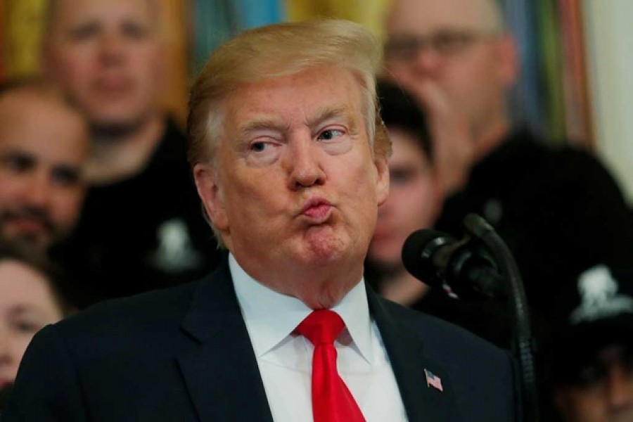 US President Donald Trump reacts as he speaks at the Wounded Warrior Project Soldier Ride event after the release of Special Counsel Robert Mueller's report, in the East Room of the White House in Washington, US, April 18, 2019. Reuters/Files