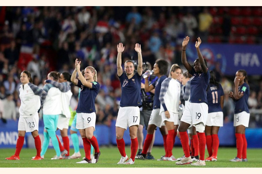 France players celebrating at the end of the Women's World Cup Group A football match between Nigeria and France at the Roazhon Park in Rennes on Monday — AP