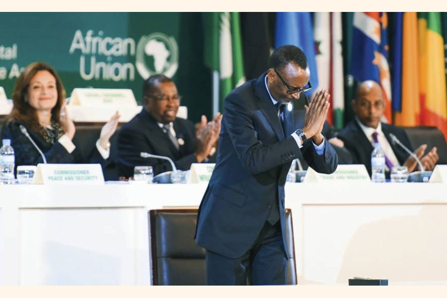 Rwandan President Paul Kagame, who was then chairman of the African Union, gestures after signing the African Continental Free Trade Area Agreement (AfCFTA) during the 10th Extraordinary Session of the AU in Kigali on March 21, 2018. AfCFTA is being called the largest free trade agreement since the creation of the World Trade Organisation. —Photo: AP