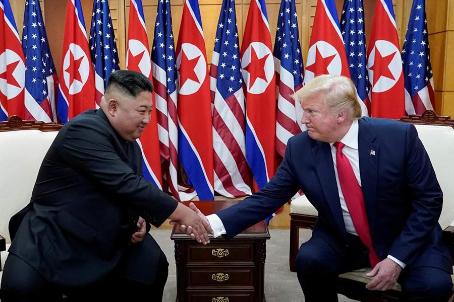 Trump shakes hands with Kim Jong-Un as they meet at the demilitarised zone separating the two Koreas, in Panmunjom, S.Korea on June 30. — Photo: Reuters