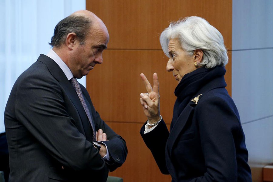 CHRISTIAN LAGARDE (RIGHT) HAS BEEN NOMINATED AS PRESIDENT OF THE EUROPEAN CENTRAL BANK (ECB) AND LUIS DE GUINDOS HAS BEEN VICE-PRESIDENT OF ECB SINCE MARCH, 2018: Luis de Guindos, then Spain's Economy Minister, listens to Christine Lagarde, then International Monetary Fund (IMF) Managing Director , during an euro zone finance ministers meeting at the European Union Council in Brussels on February 11, 2013. — Photo: Reuters