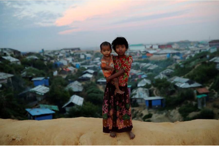 Rohingya refugee children pose for a picture at the Balukhali camp in Cox's Bazar, Bangladesh, on November 15. A plan to begin repatriating hundreds of thousands of Rohingya Muslim refugees to Myanmar has stalled amid protests by refugees at camps in Bangladesh and recriminations between the officials in both countries. — Photo: Reuters --