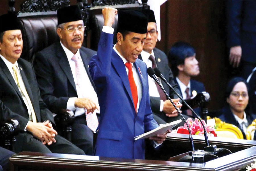 Indonesia President Joko Widodo delivers a speech in parliament in Jakarta on Friday: He formally proposed to parliament on Friday a plan to relocate Indonesia's capital from Jakarta to Kalimantan on the island of Borneo —Photo: Reuters