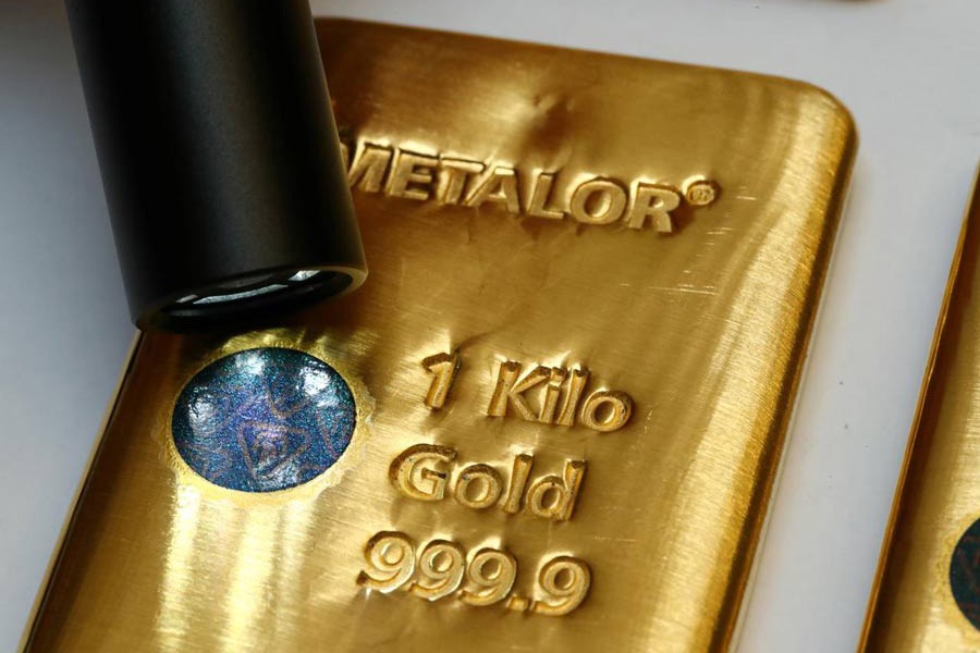 The Sicpa Oasis validator system (bullion protect) is pictured on one kilogramme bar of gold at Swiss refiner Metalor in Marin near Neuchatel, Switzerland — Reuters