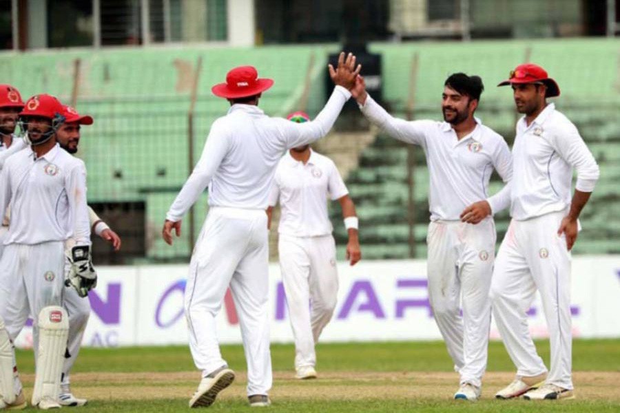 Afghanistan's captain Rashid Khan celebrating after taking a wicket against BCB XI during a practice match in the 2nd and final day at MA Aziz Stadium in Chattogram on Monday — bdnews24.com