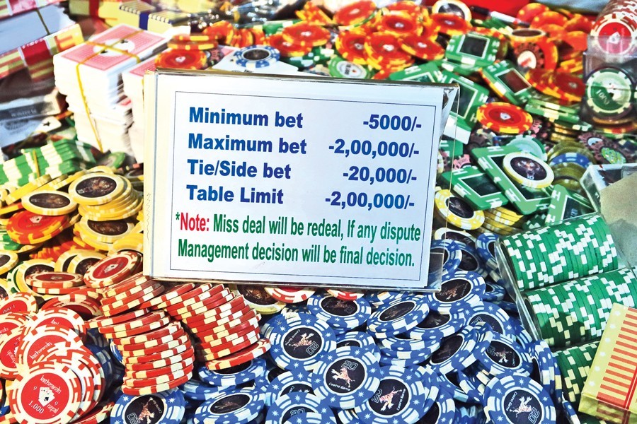 Casino chips and other gambling items seized during a raid by law enforcement personnel on the Victoria Sporting Club at Motijheel in the city on Sunday — FE photo