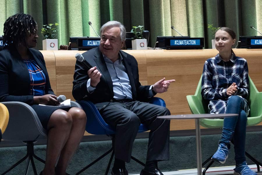 UN Secretary-General António Guterres (centre) and Greta Thunberg (right), Youth Climate Activist, at the opening of the UN Youth Climate Summit on September 21, 2019. — Courtesy: UN Photo/Kim Haughton