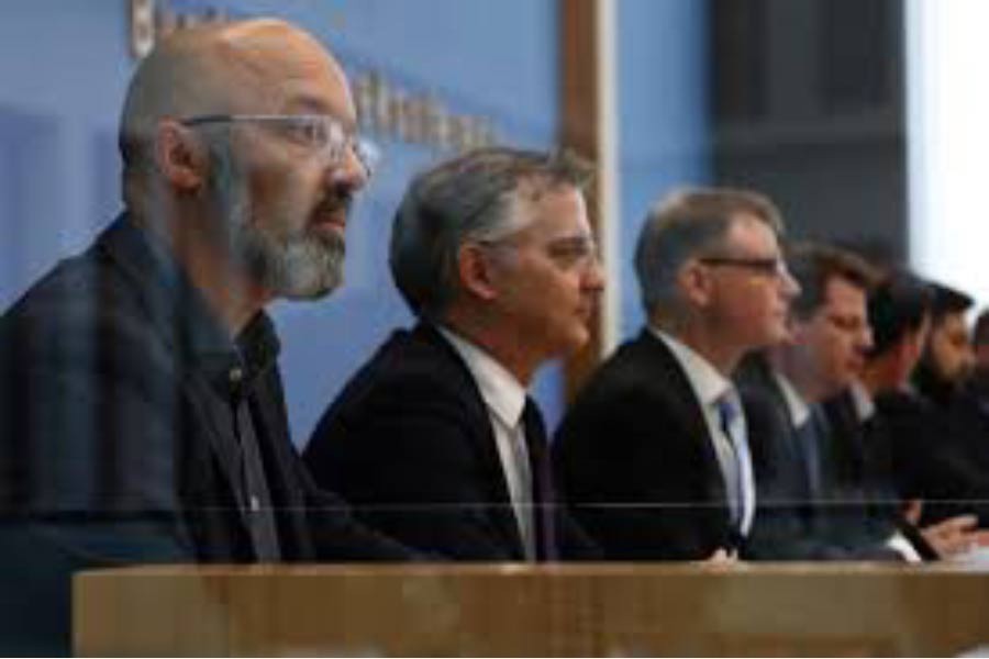 Timo Wollmershaeuser of IFO Institute, Torsten Schmidt of RWI Leibniz Institute of Economy Essen, Stefan Kooths of Institute of World Economy Kiel, Oliver Holtemoeller of Liebniz Institute of Economy, Malte Rieth of DIW Berlin and Claus Michelsen, spokesperson of Economic Institutes (DIW Berlin) attending a news conference in Berlin, Germany on Wednesday