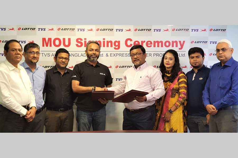 Officials of Lotto and TVS Auto Bangladesh pose for photograph during the signing of an MoU in the city recently.