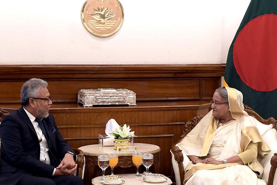 Secretary-General of Developing-8 Ambassador Jaafar Ku Shaari paying a courtesy call on Prime Minister Sheikh Hasina at the PMO on Thursday. -PID Photo