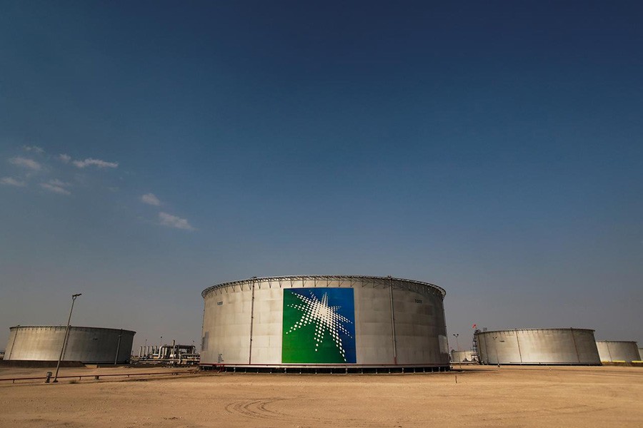 A view shows branded oil tanks at Saudi Aramco oil facility in Abqaiq, Saudi Arabia last month. -Reuters file photo