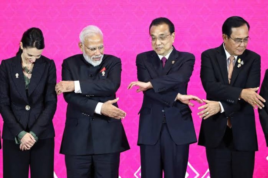 New Zealand's prime minister Jacinda Ardern, India's prime minister Narendra Modi, Chinese premier Li Keqiang and Thai prime minister Prayuth Chan-Ocha shake hands at the third Regional Comprehensive Economic Partnership (RCEP) summit in Bangkok, Thailand, November 4, 2019. Reuters